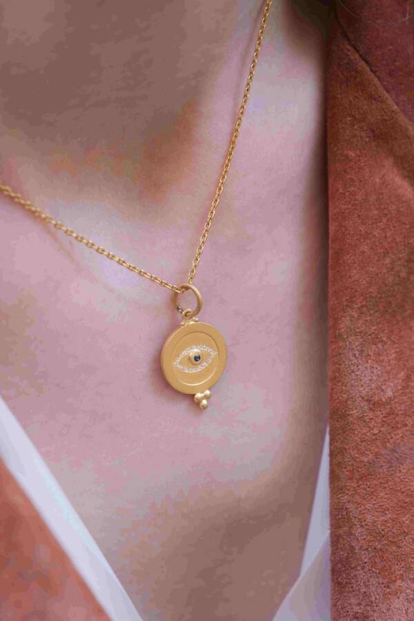 EYE MEDALION WITH DIAMONDS & SAPPHIRE - Image 2